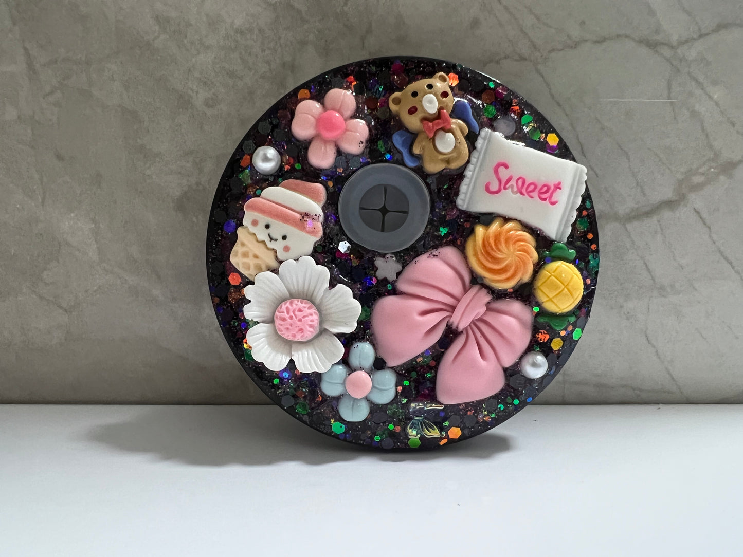 Black jelly lid with candy bear