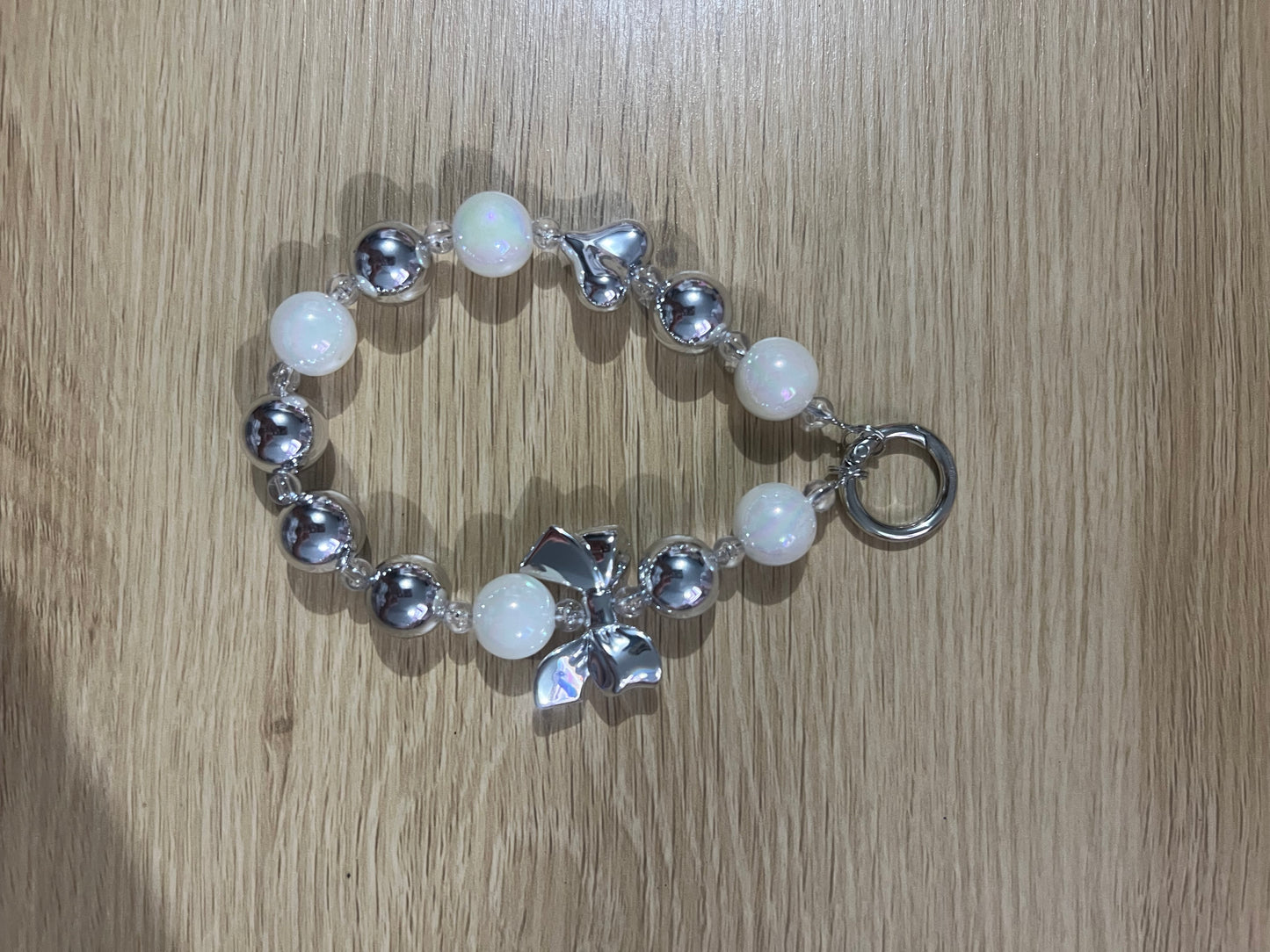 Silver and white beaded keychain