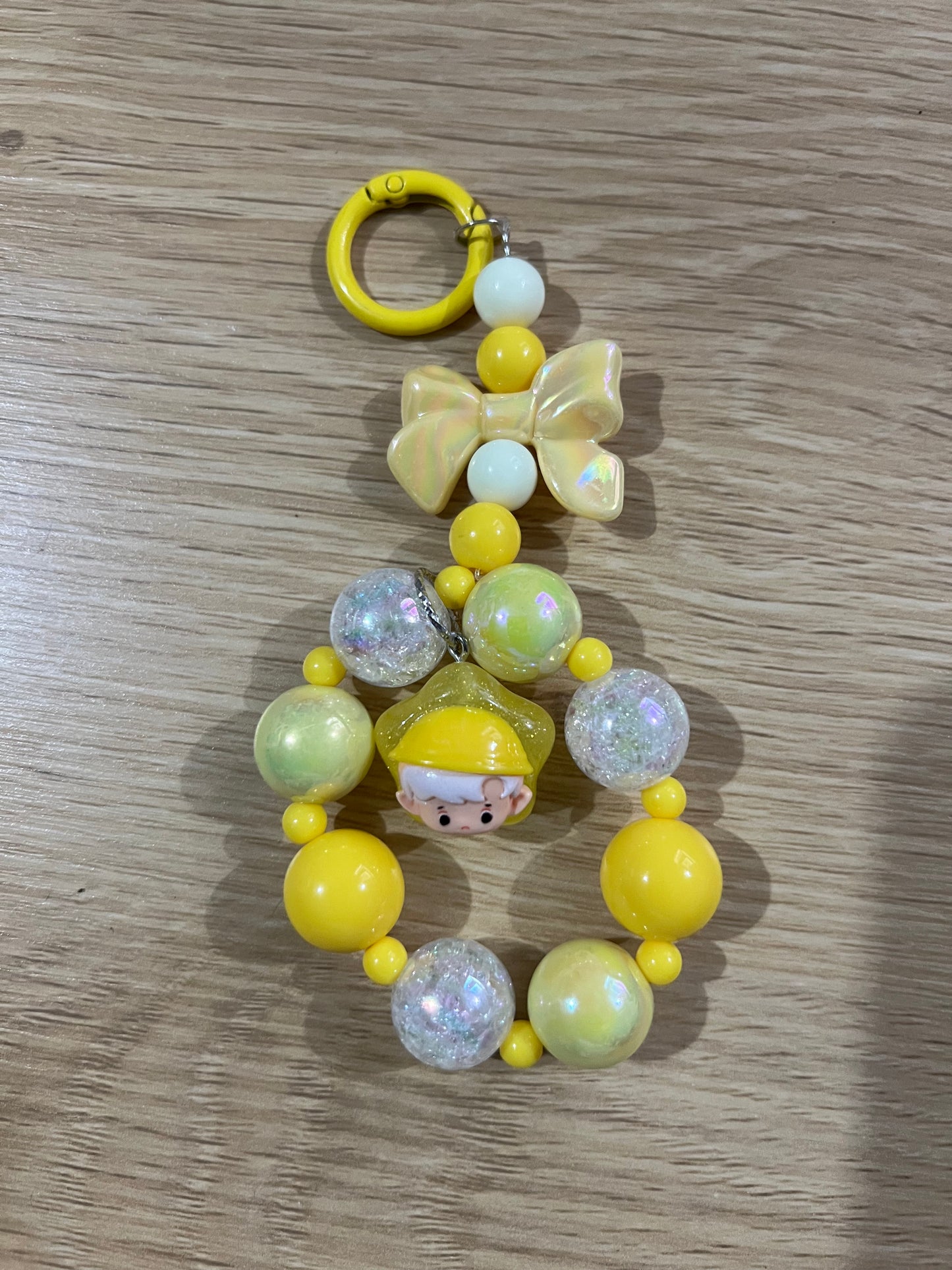Yellow boy and bow keychain